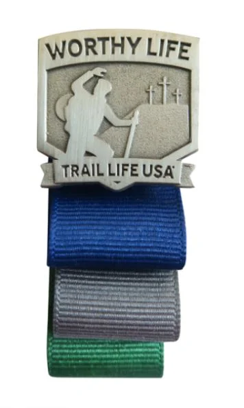 Trail Life USA advancement trail graphic depicting the path to manhood.